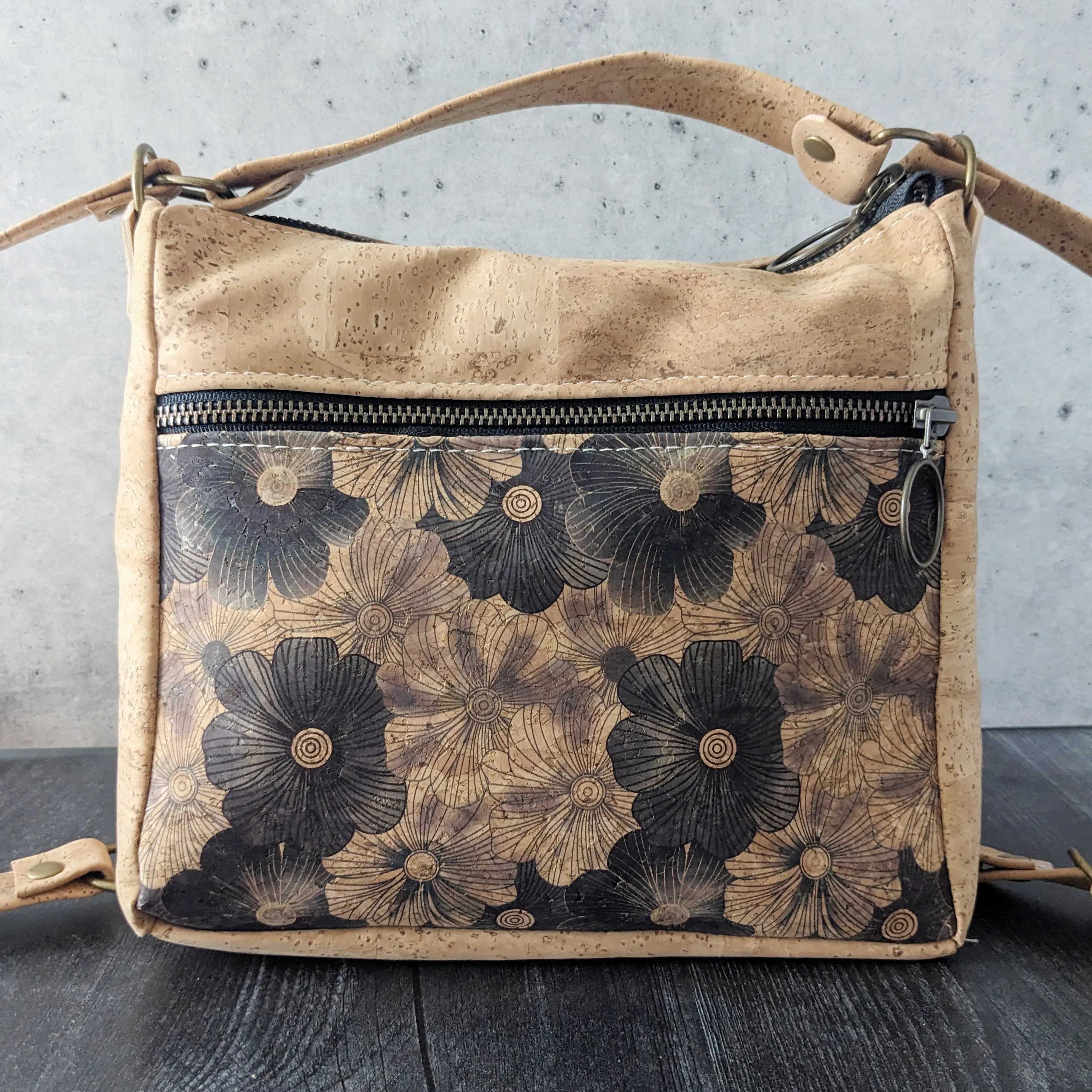 Small Zip Top Crossbody Backpack in Black Flower Cork